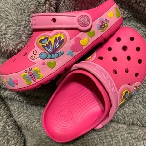 Pink butterfly crocs
